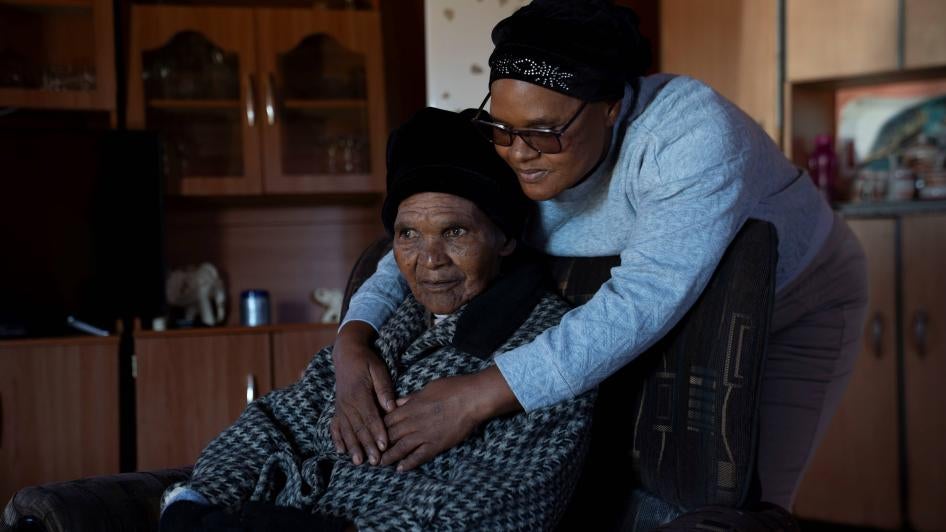 Pamela Nokuthembela Ndoyana embraces her mother, Nozala Ndoyana , 84, in their home