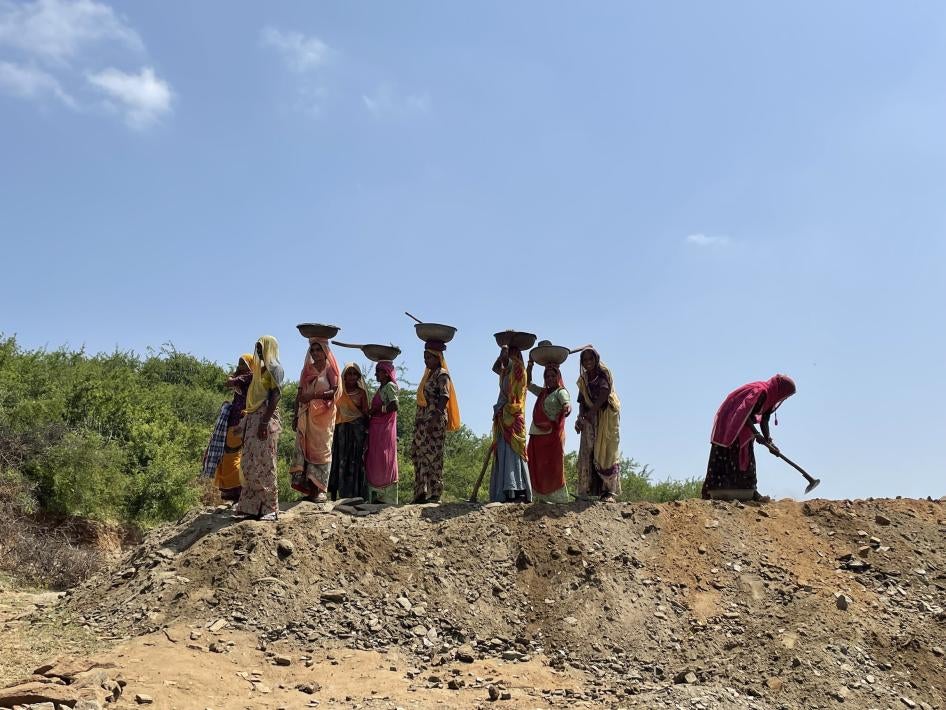 Women working at a job site in a village in Rajasthan under the Mahatma Gandhi National Rural Employment Guarantee Act (NREGA), September 2022. NREGA is the Indian government’s income security program in rural India.