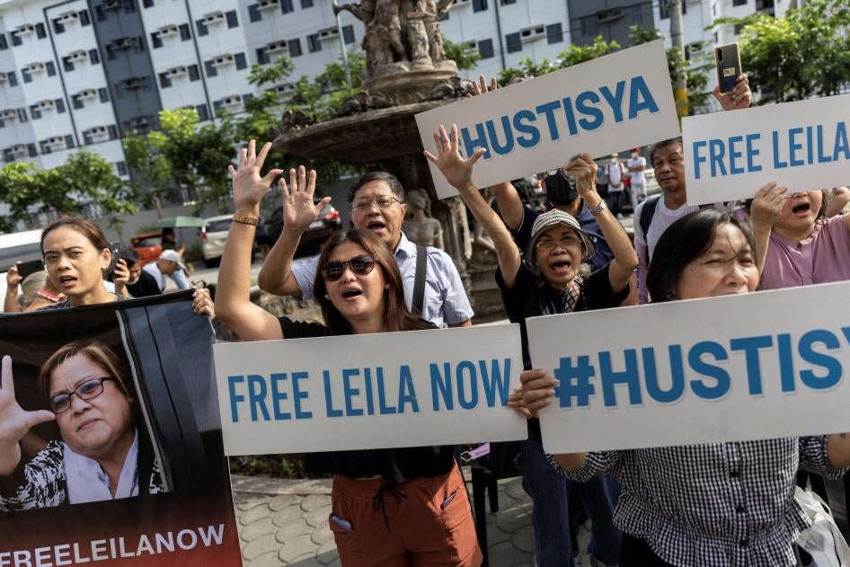 Supporters of former senator Leila de Lima outside the Hall of Justice in Muntinlupa City, Philippines, May 12, 2023.