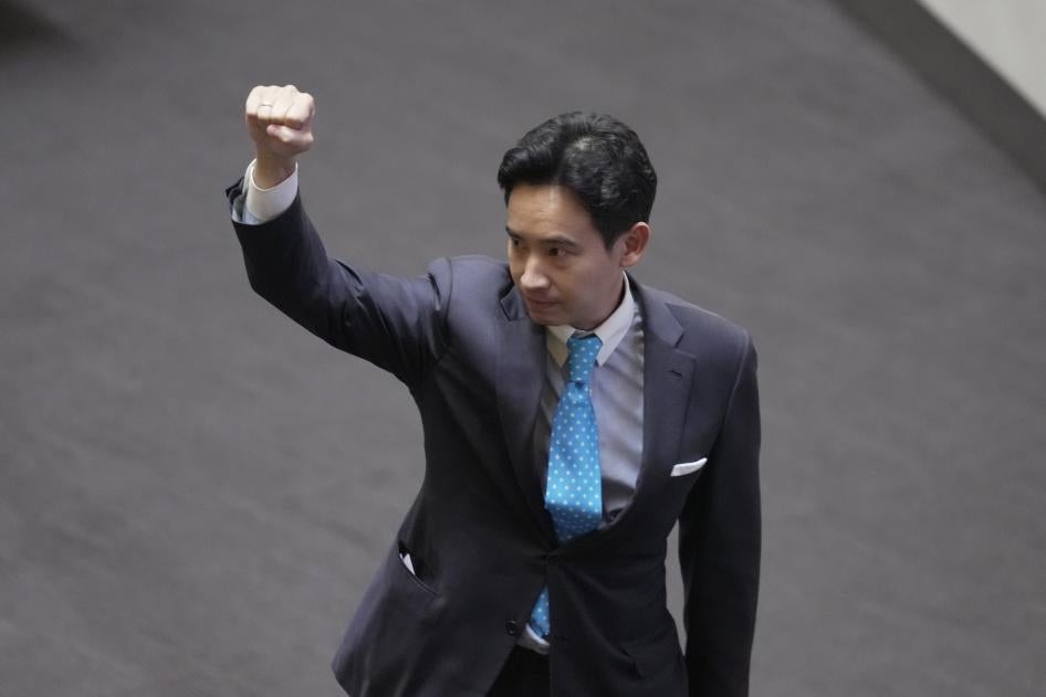 Pita Limjaroenrat, the leader of the Move Forward Party and top winner in May's general election, raises his hand as he leaves Parliament in Bangkok, Thailand, July 19, 2023.