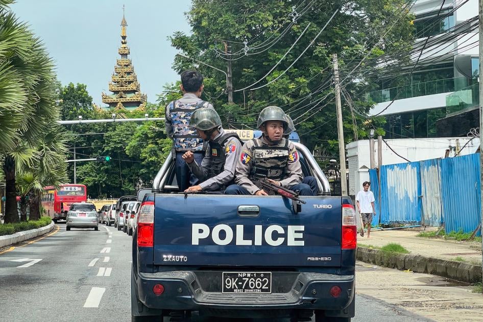 : Police patrol the 76th Martyrs' Day in Yangon, Myanmar on July 19, 2023. 