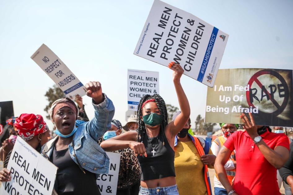 Community members protest against gender-based violence in Vlakfontein, South Africa, August 25, 2021. 