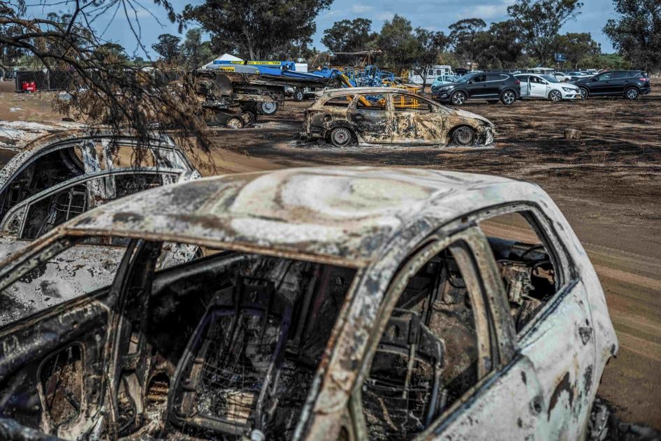 A view of destroyed vehicles near the grounds of the Supernova electronic music festival. 