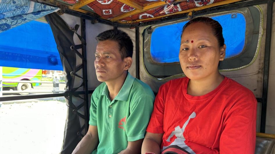 Til and his wife Chitrakala head to the hospital in an auto rickshaw, Butwal, Nepal, July 22, 2023.