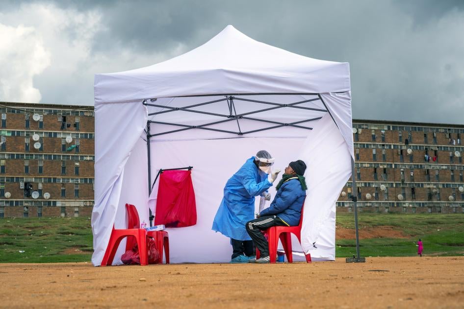 A resident from the Alexandra township gets tested for COVID-19 in Johannesburg, South Africa, April 29, 2020.
