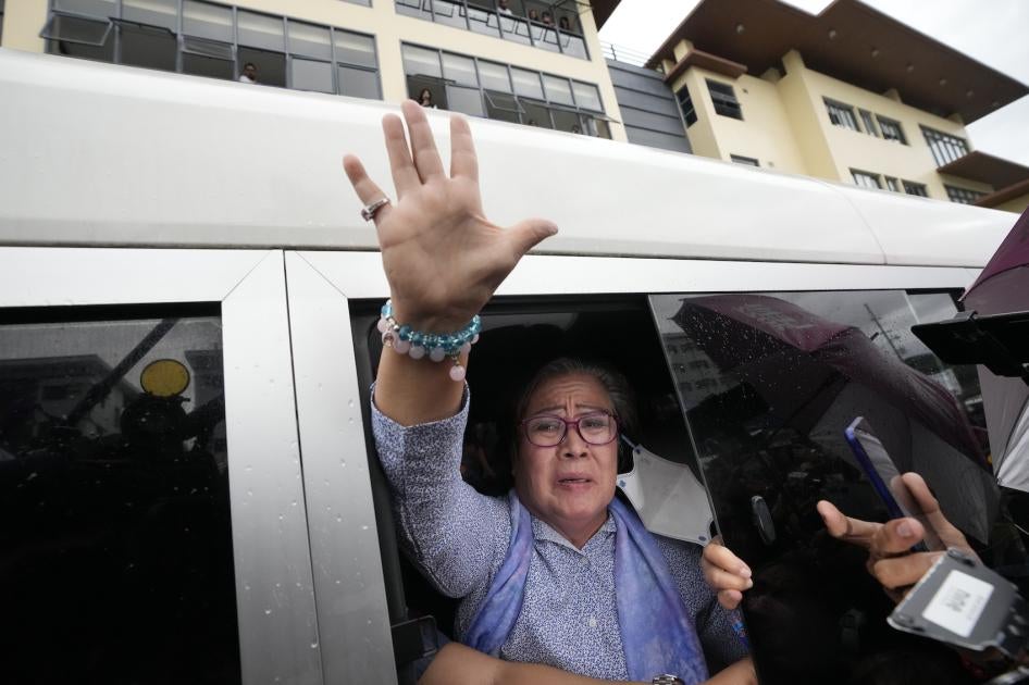 Former Senator Leila de Lima waves to supporters after leaving the Muntinlupa City trial court in the National Capital Region, Philippines, November 13, 2023.