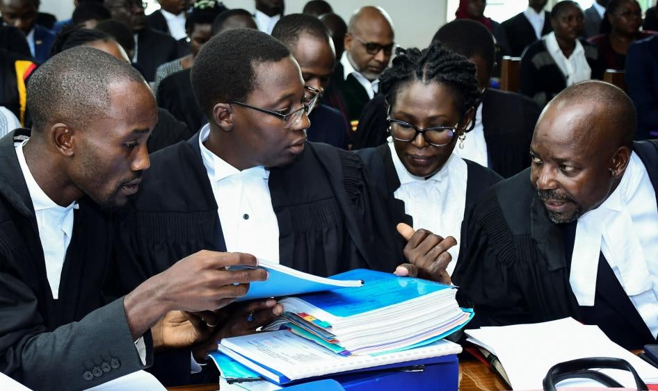 Human Rights lawyers led by West Budama North East Constituency Member of Parliament Fox Odoi-Oywelowo (R) attend the hearing of petitions and applications challenging the anti-gay law at the constitutional court in Kampala, Uganda, November 28, 2023. 