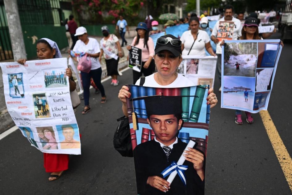 People take part in a protest demanding the release of relatives who were arrested during the state of emergency decreed by Salvadoran authorities to fight criminal groups, in San Salvador, on November 18, 2023. 