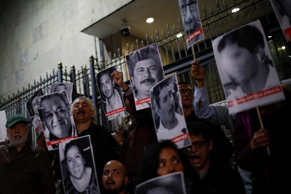 Journalists and activists hold pictures of murdered journalists during a protest outside the Interior Ministry building, to demand justice for the killing of Mexican journalist Luis Martin Sanchez Iniguez, Mexico City, Mexico, July 10, 2023. 