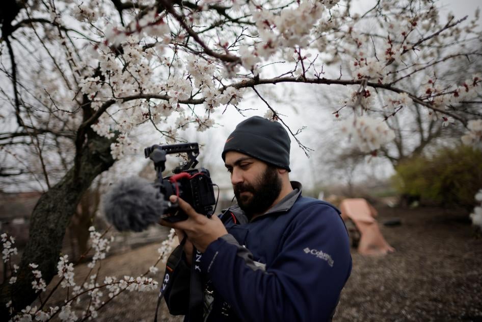 Reuters' journalist Issam Abdallah films an interview amid Russia's attack on Ukraine, in Zaporizhzhya, Ukraine, April 17, 2022.