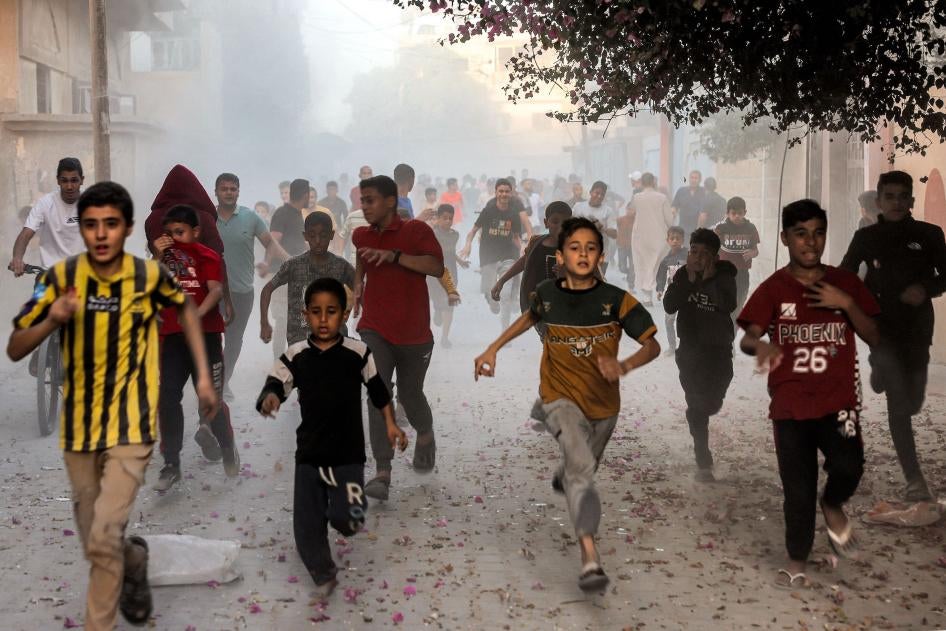 Palestinian children fleeing from Israeli bombardment in Rafah in the southern Gaza Strip on November 6, 2023. 