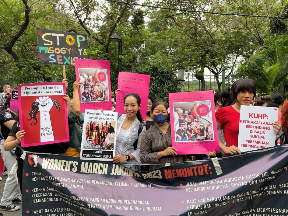 Demonstrators for women's rights demand that the government revoke mandatory hijab regulations, Jakarta, Indonesia, May 2023.