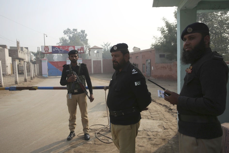Police officers stand guard outside Multan jail after Junaid Hafeez, a university professor, was sentenced to death for alleged blasphemy, Multan, Pakistan, December 21, 2019.