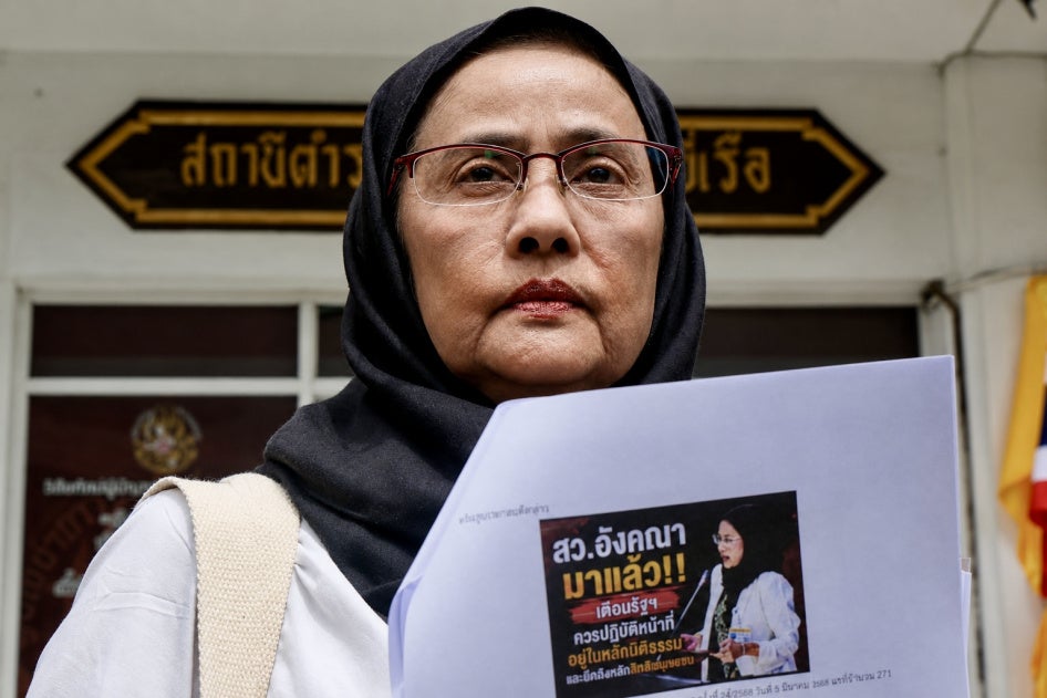 Angkhana Neelapaijit reports online attacks against her at Bang Yi Reua police station in Bangkok, Thailand, July 31, 2026.