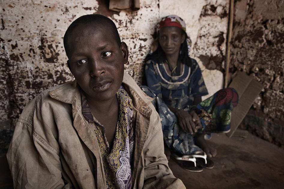 Suleiman, a 17-year-old-boy with an intellectual and physical disability, with his mother, Amina, in the Muslim enclave in Yaloke. Suleiman escaped attacks by anti-balaka forces, but witnessed his uncle being brutally killed.
