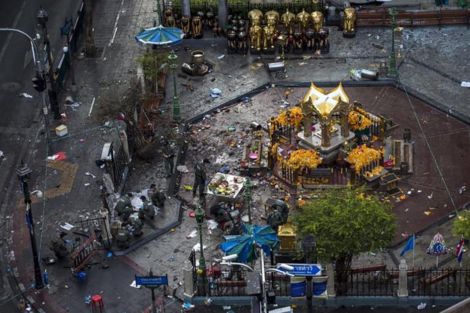 Experts investigate the Erawan shrine at the site of a deadly blast in central Bangkok, Thailand on August 18, 2015.