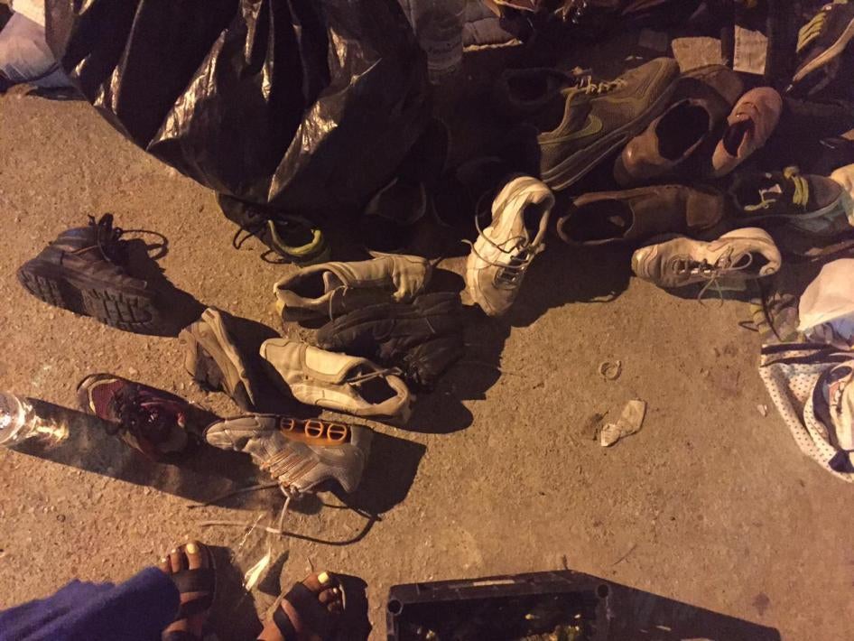People living on the Greek island of Lesbos leave a pile of shoes for refugees and migrants who are walking across the island, September, 2015. 