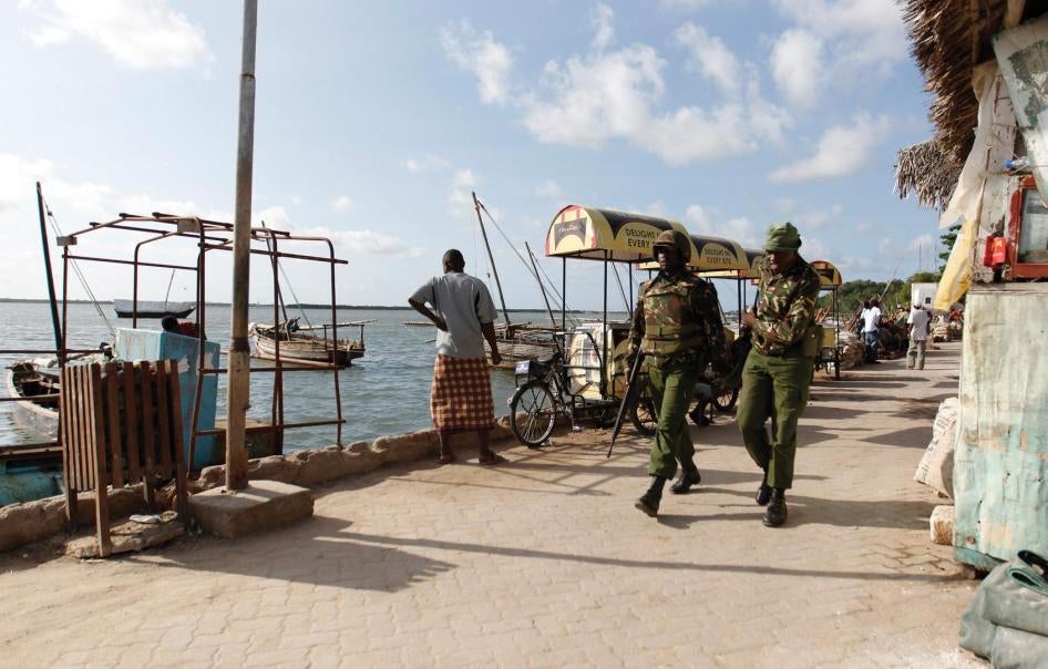 Kenya police officers on patrol in the coastal town of Lamu in June 2014 in the wake of a series of attacks in Lamu and Tana River counties.