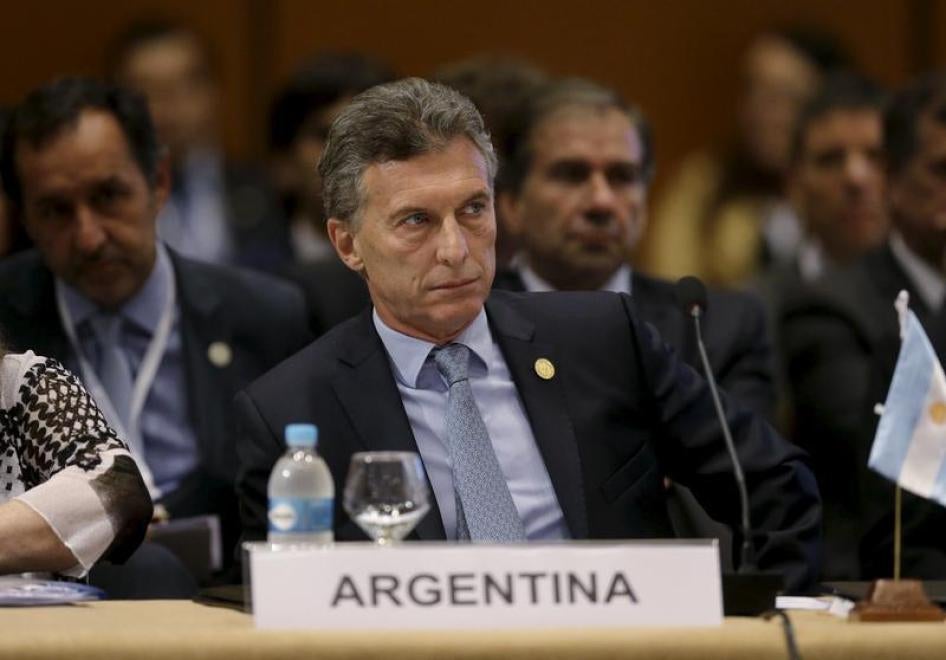 Argentina's President Mauricio Macri attends a session of the Summit of Heads of State of MERCOSUR and Associated States and 49th Meeting of the Common Market Council in Luque, Paraguay, December 21, 2015.