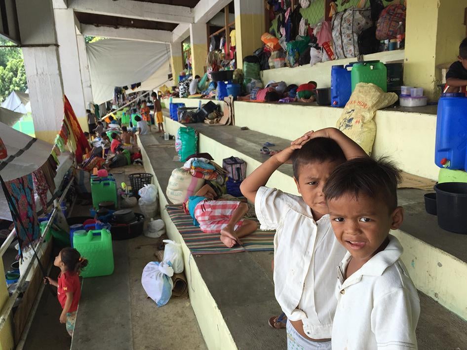 Children at a sports center in Tandag City, Philippines on September 13, 2015. Many tribal people sought refuge at the sports center after the paramilitary group Magahat attacked their villages and schools on September 1.