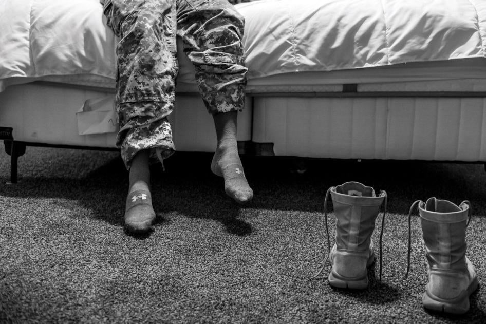 A US Army specialist and military sexual assault survivor on her bed in Fayetteville, North Carolina.
