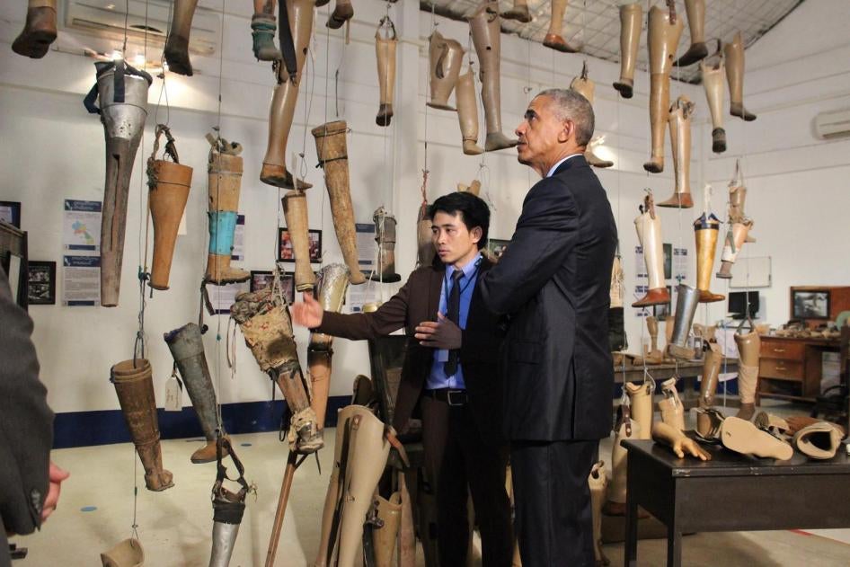 During President Obama's historic visit to Laos, he met with cluster bomb victims and toured the Cooperative Orthotic and Prosthetic Enterprise (COPE) visitors' centre in Vientiane with its operations manager Soksai Sengvongkham.