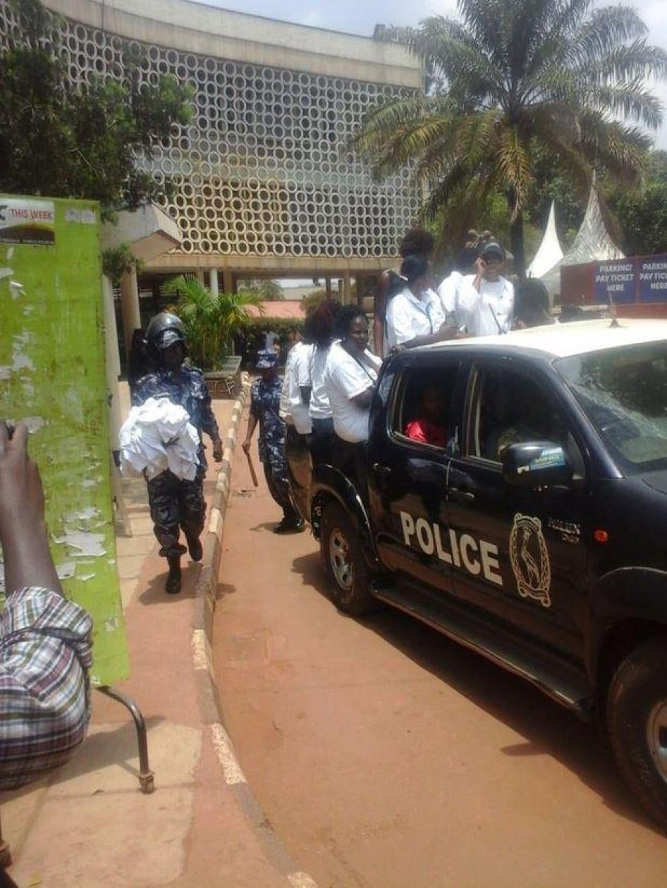 Police arresting women activists and taking them to Kiira road police station in Kampala, Uganda, on September 13, 2016.