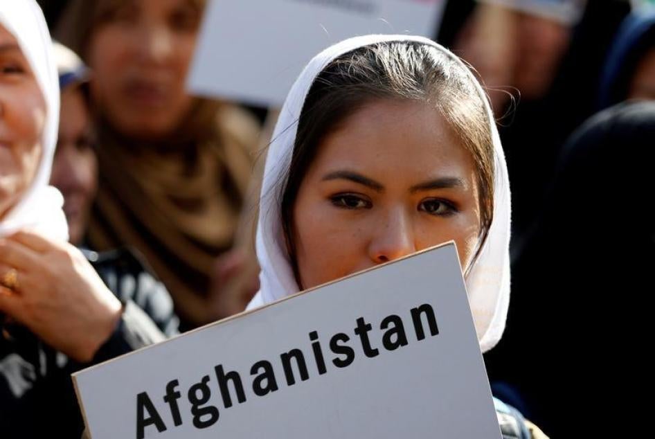 A demonstrator attends a rally outside the Brussels Conference on Afghanistan, Belgium, October 5, 2016.