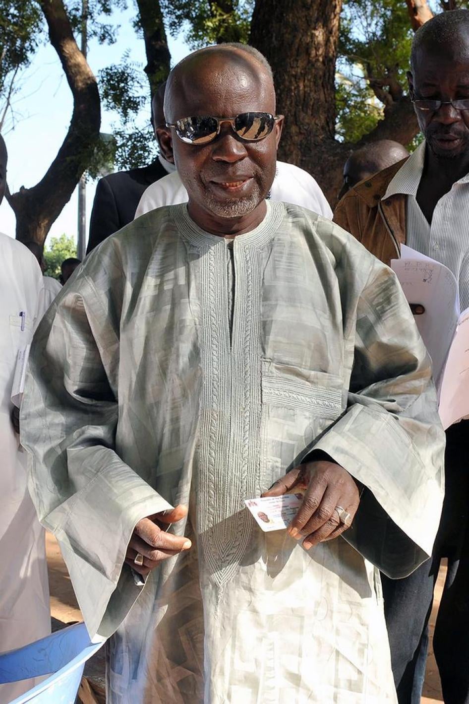 United Democratic Party (UDP) leader Ousainou Darboe votes at a polling station outside Banjul during the 2011 presidential elections, November 24, 2011. 