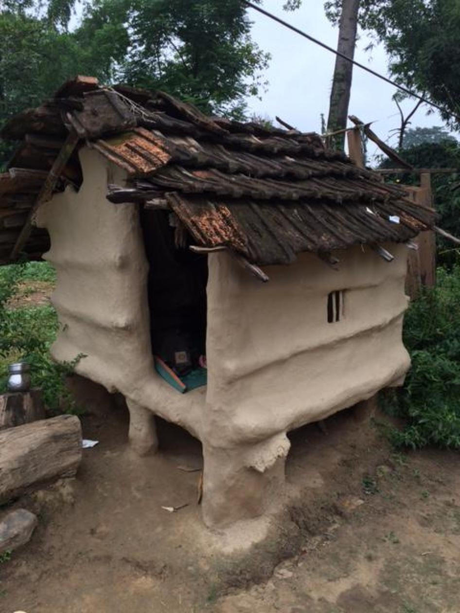 A chaupadi hut, in a family's yard, where female members of the family are obliged to sleep during their menstrual periods. Kailali district, western Nepal.