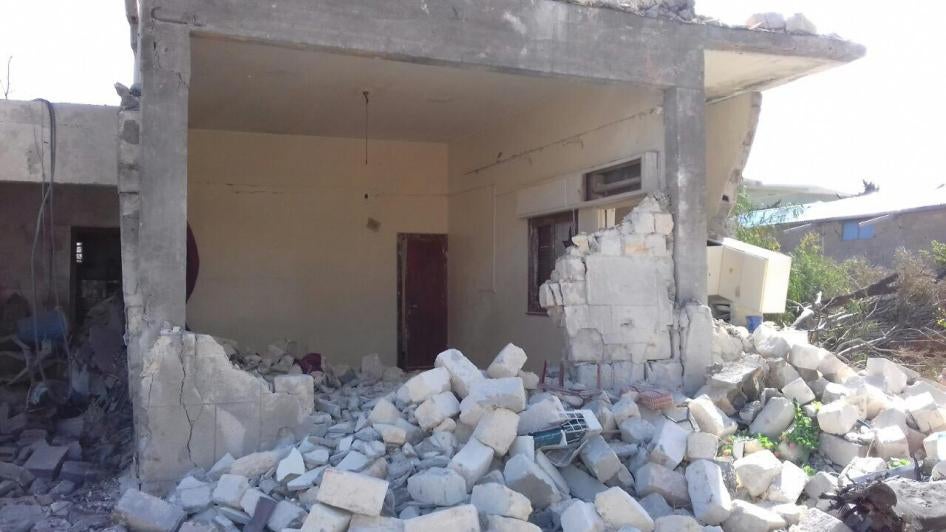 Damage to staff residences at Al-Wahda Hospital in Derna, Libya due to air strikes on February 7, 2016, according to a witness.