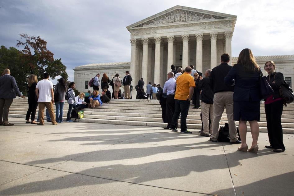 People line up outside of the Supreme Court in Washington, Tuesday, Oct. 13, 2015, as Justices began to discuss Montgomery v. Louisiana.
