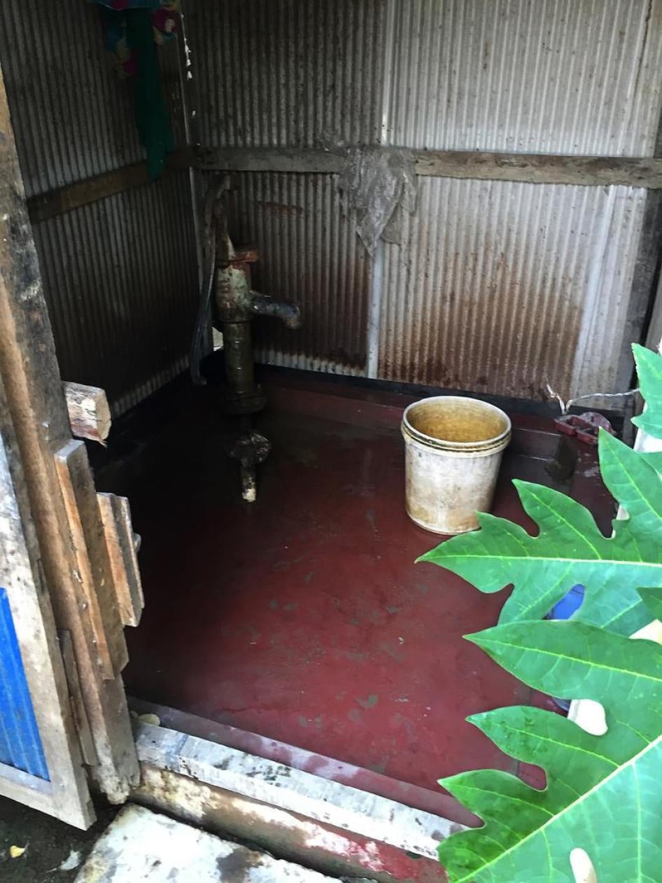 A government tubewell Installed inside a small tin shed inside the fenced compound of the caretaker’s house, 2015. © 2015 Richard Pearshouse/Human Rights Watch
