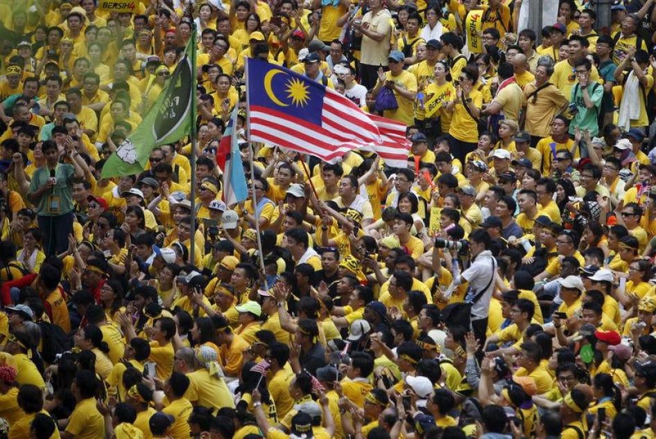 "Bersih" (Clean) supporters gather along Jalan Tun Perak in Kuala Lumpur on August 29, 2015. 