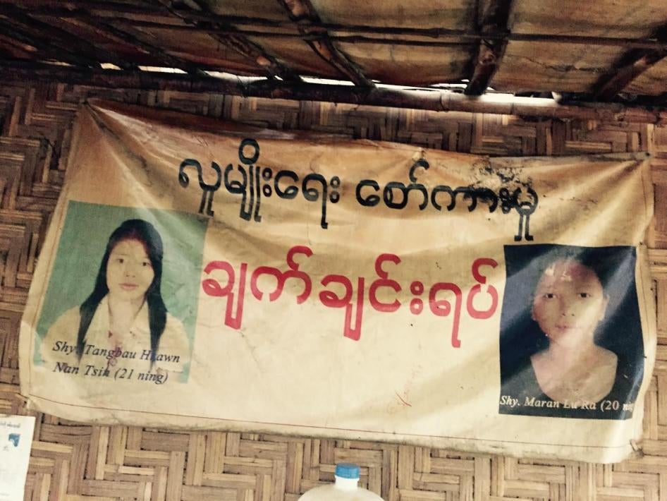 Poster in a displacement camp in Myitkyina, Kachin State, of two murdered ethnic Kachin teachers, Maran Lu Ra, 20, and Tangbau Hkawn Nan Tsin, 21. 