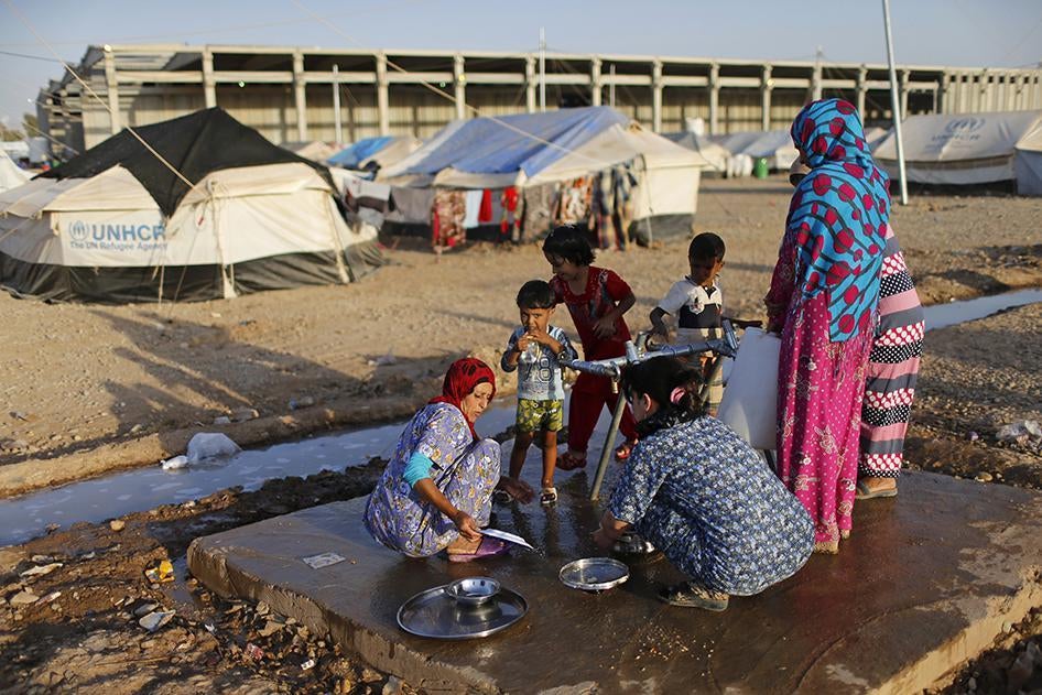 Iraqis who fled from ISIS in Nineveh find shelter at a camp for displaced persons in the Kurdistan Region of Iraq.