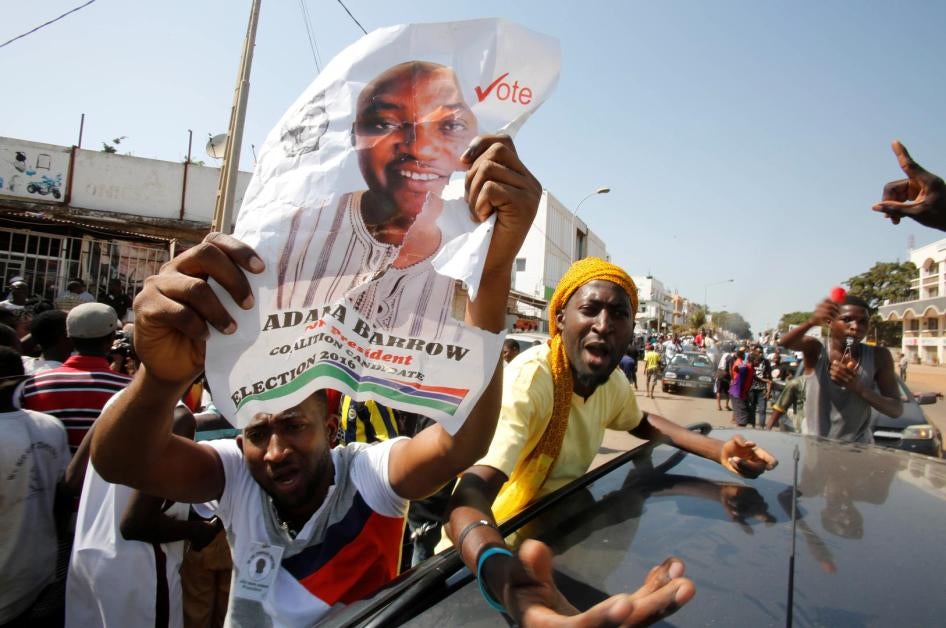 Supporters of president-elect Adama Barrow celebrate Barrow's election victory in Banjul, Gambia, December 2, 2016. 