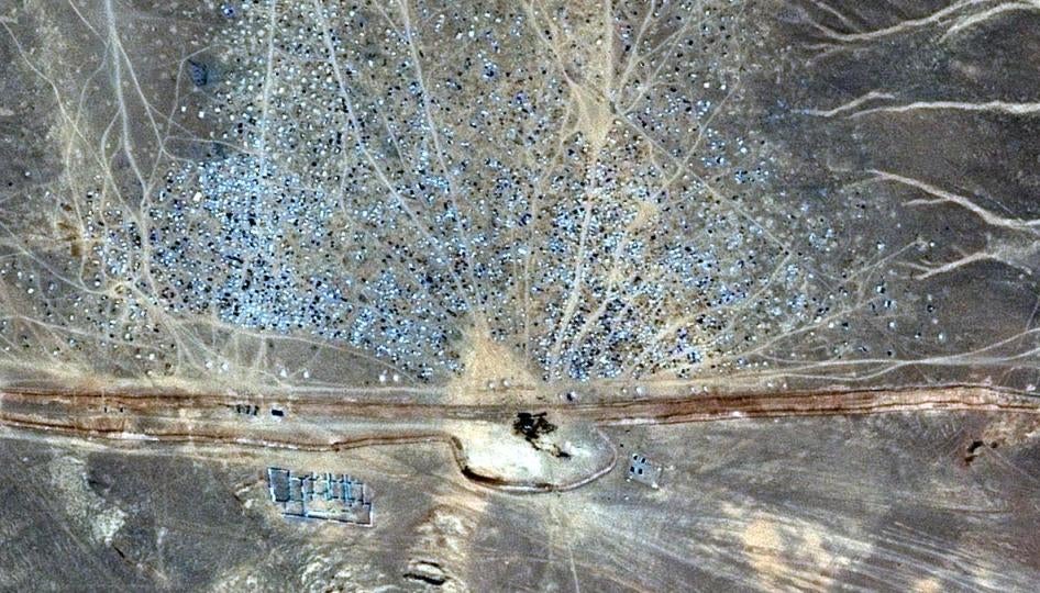 Satellite image of the Rukban Syrian refugee encampment at the Jordanian berm on Jordan-Syria border, June 24, 2016. 