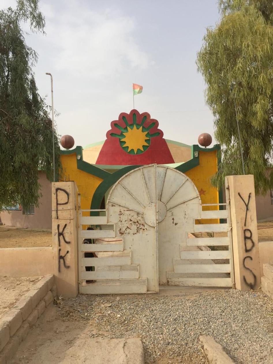 The former Yezidi Lalish cultural center in Khanasoor, Sinjar, now run by YBŞ/HPG-affiliated women, including fighters. A 14-year-old girl in uniform who was guarding the center in August said she had joined the YBŞ as “a fighter.”