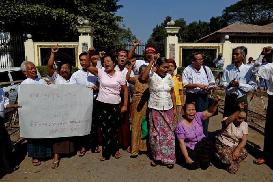 Released political prisoners shout for the release of other political prisoners in front of Insein prison in Rangoon, Burma on January 22, 2016.
