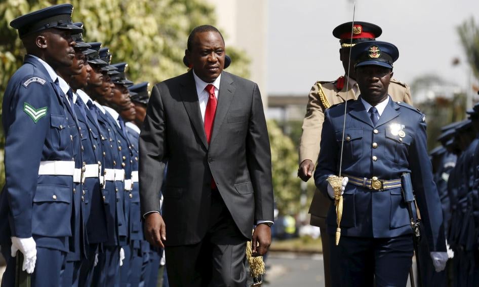 Kenya's President Uhuru Kenyatta inspects a guard of honor