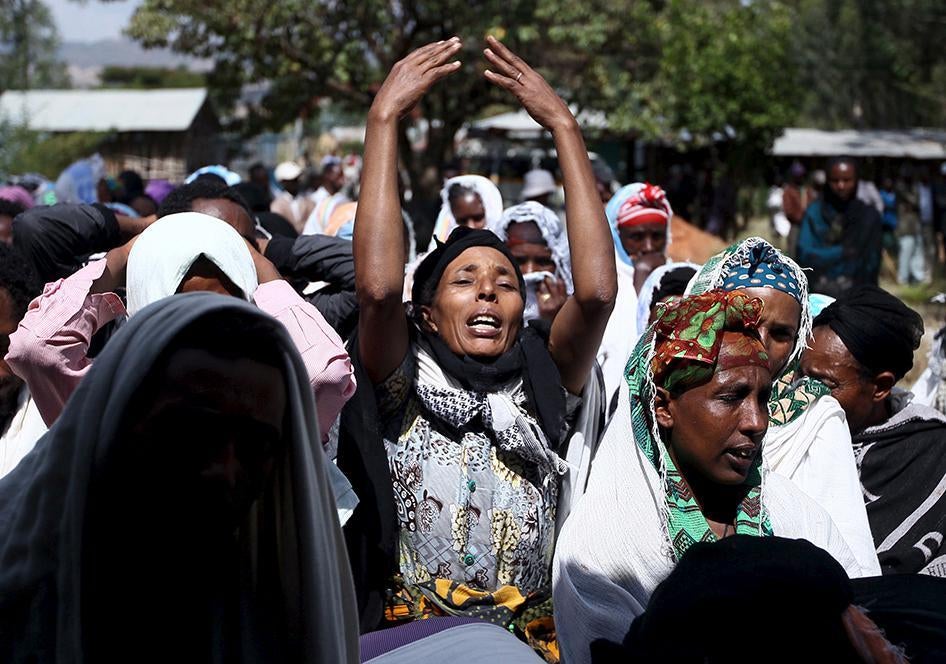 Women mourn during the funeral ceremony of a primary school teacher who family members said was shot dead by military forces during protests in Oromia, Ethiopia in December 2015. December 17, 2015.
