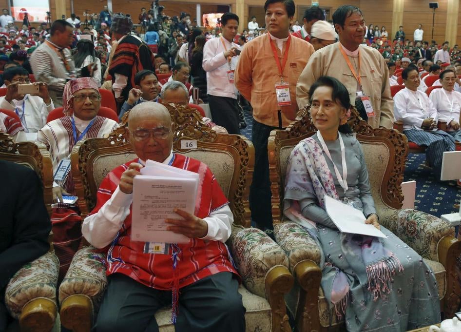 Aung San Suu Kyi waits to give a speech during ceasefire talks between the government, army, and representatives of ethnic armed groups in the capital, Naypyitaw, on January 12, 2016. 