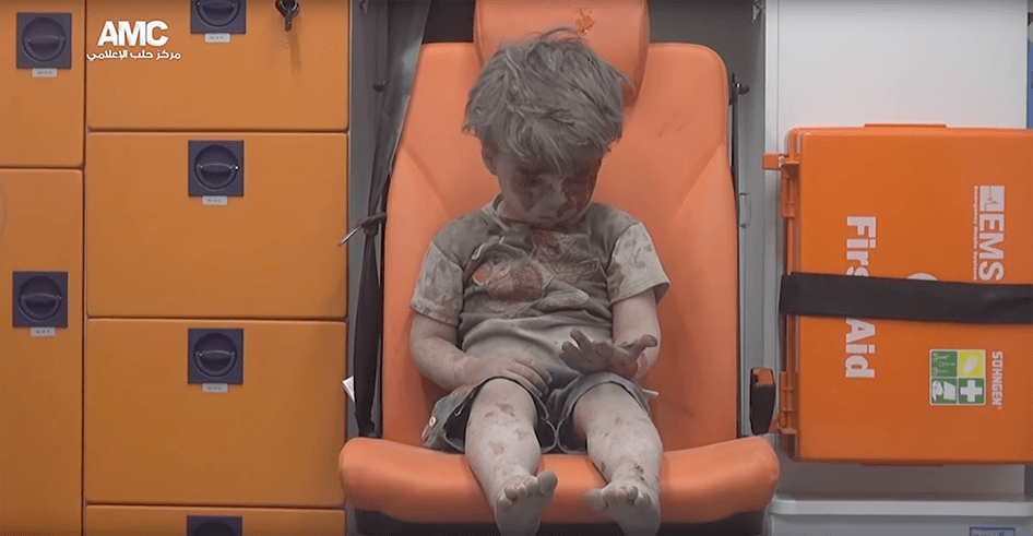 A still from video shows Omran, the 5-year old boy who was pulled out of the rubble after an airstrike in Aleppo, Syria on August 17, 2016. 
