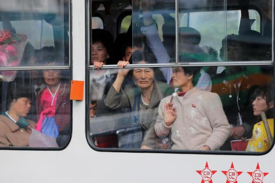 People ride a tram in Pyongyang, North Korea, May 20