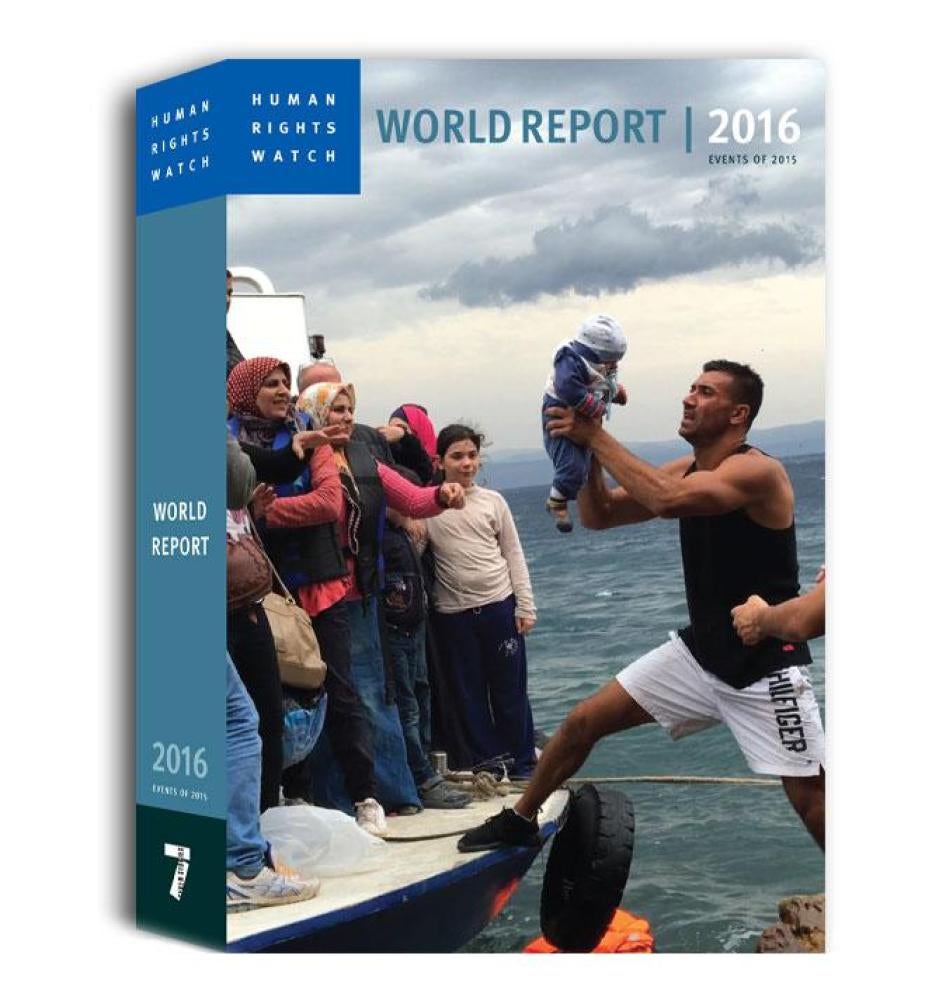 World Report 2016. Cover: Asylum seekers and migrants descend from a fishing vessel used to transport them from Turkey to the Greek island of Lesbos, October 11, 2015.