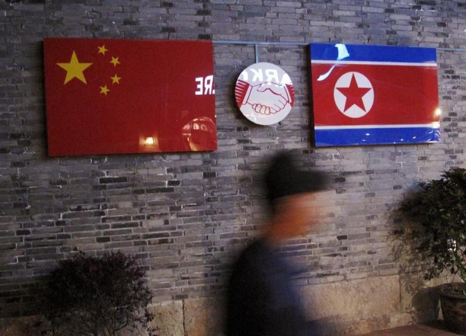 Flags of China and North Korea are seen outside the closed Ryugyong Korean Restaurant in Ningbo, Zhejiang province, China, in this April 12, 2016 file photo.