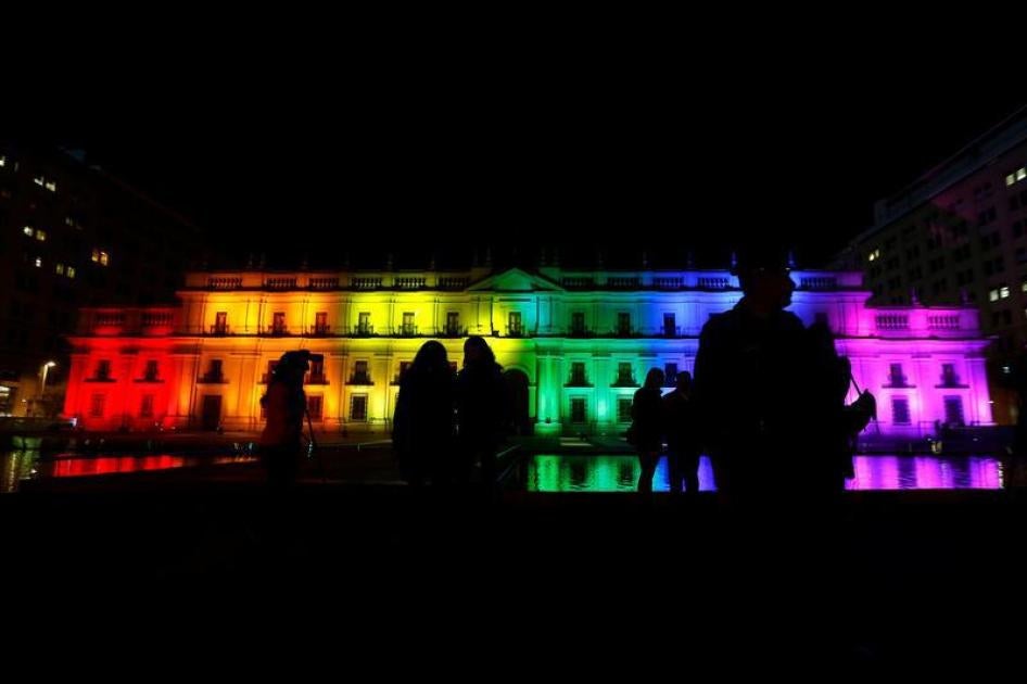 Chile's government house is illuminated with rainbow colours to mark International Day Against Homophobia in Santiago, Chile, May 17, 2016. 