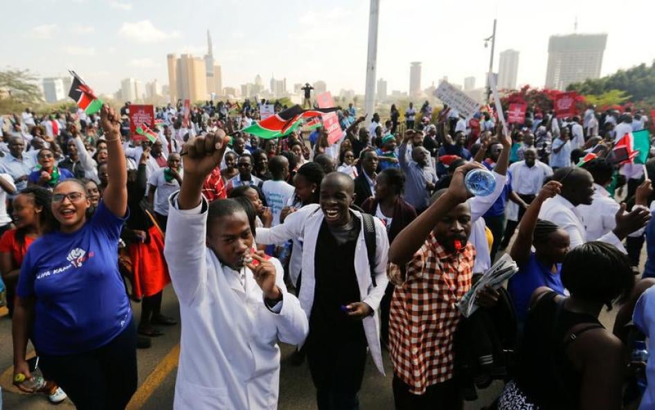 Kenyan doctors chant slogans to demand fulfilment of a 2013 agreement between their union and the government that would raise their pay and improve working conditions outside the employment and labour relations courts in Nairobi, Kenya, January 26, 2017.