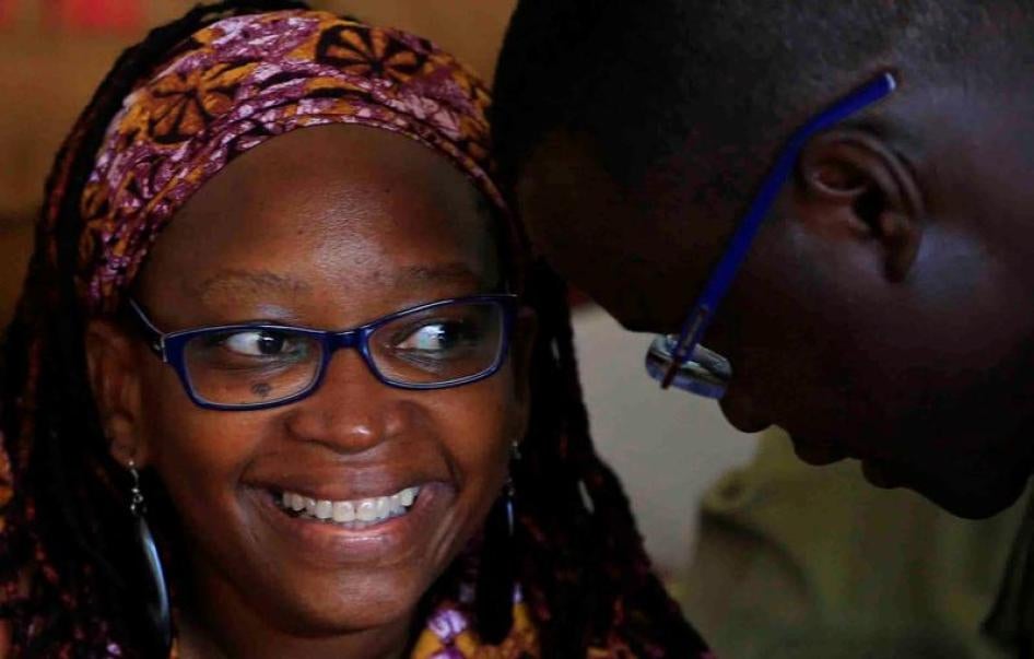 Ugandan prominent academic Stella Nyanzi (L) speaks with her lawyer during court appearance for criticising the wife of President Yoweri Museveni on social media, at Buganda Road Court, Kampala, Uganda April 10, 2017.